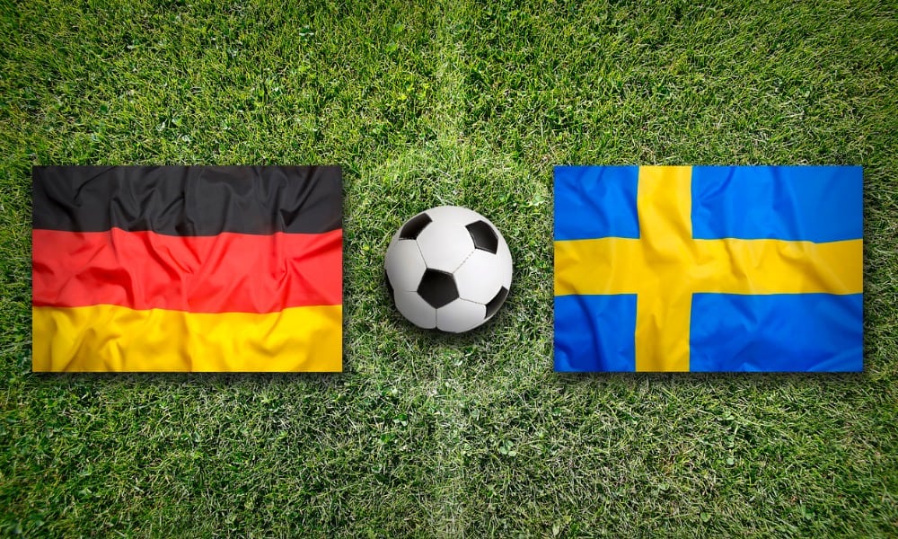 germany vs sweden flags on soccer field picture id648600344