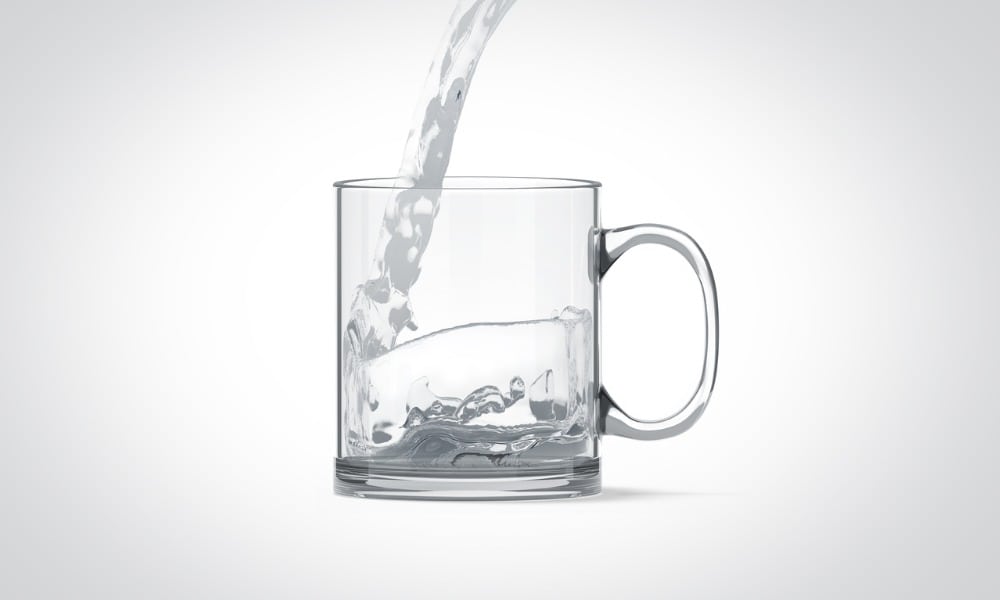 pouring water in blank transparent glass mug mock up isolated picture id690806946